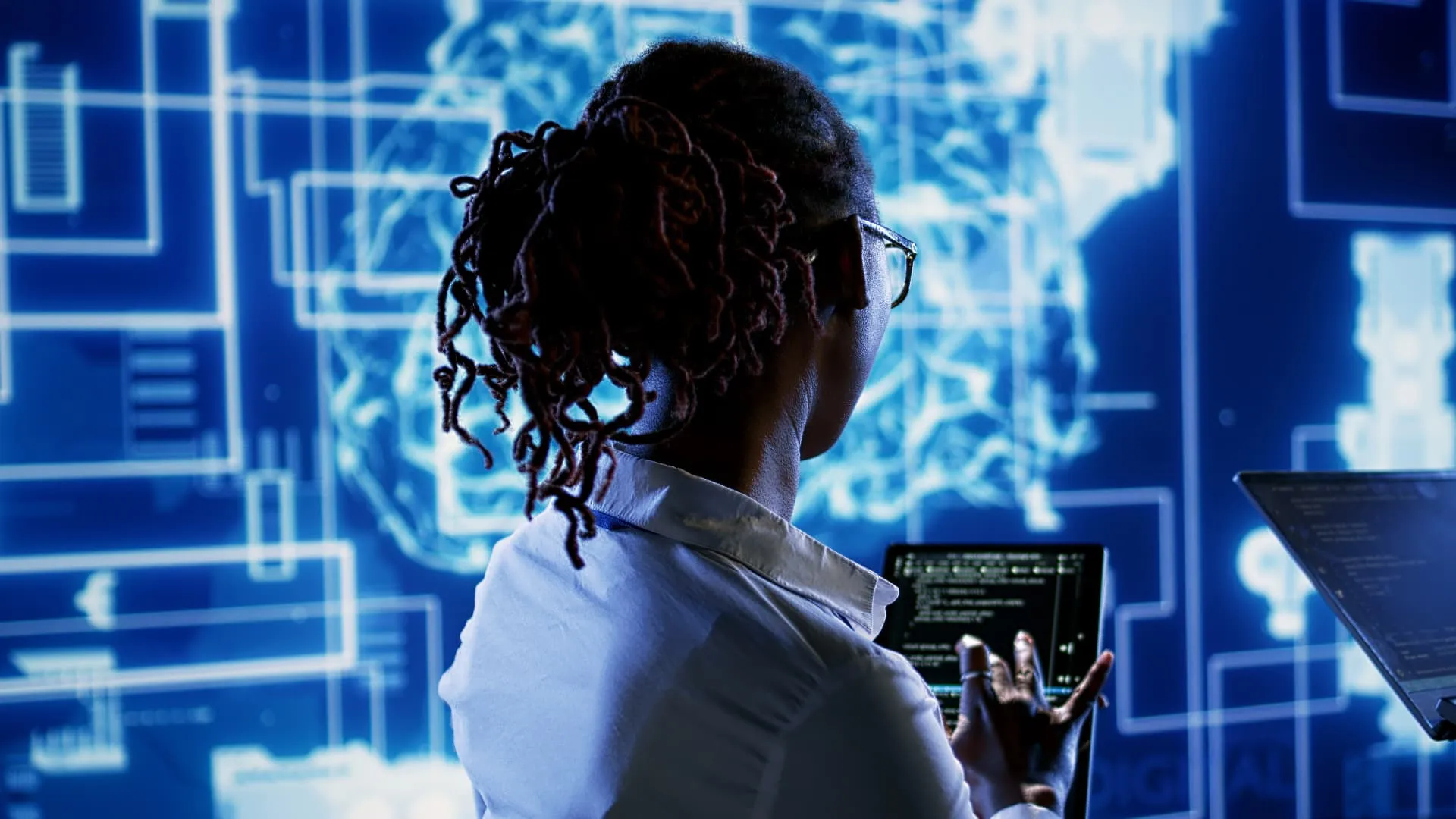 A technologist mapping a complex system